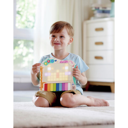 Instrumento musical infantil Hape con luces y creatividad para primeros años.