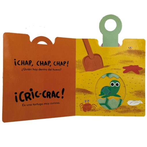 Detalle del mecanismo pop-up: la solapa hace “crac” y revela un dibujo interior.